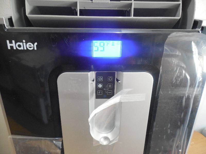 lot 92 image: 12,000 BTU 115-Volt Portable Air Conditioner with Full-Function Remote Control