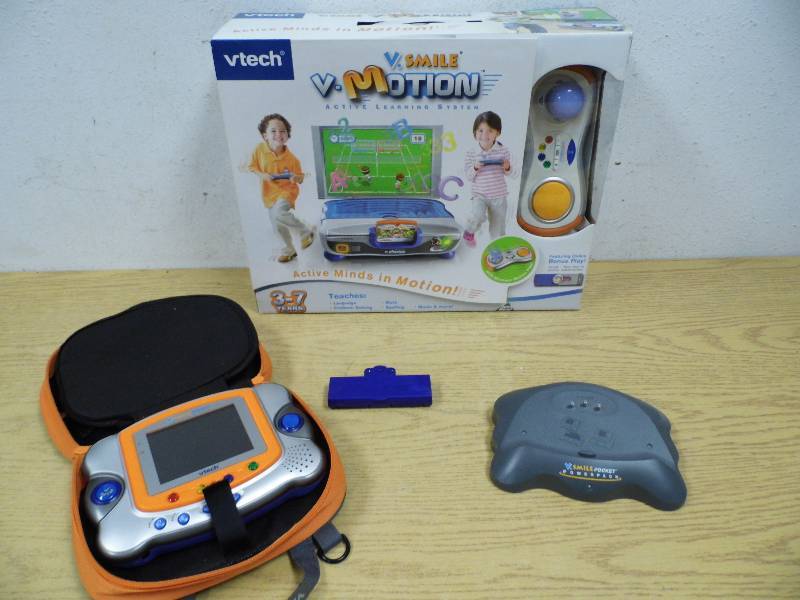 lot 2 image: Vtech Vsmile Video Game Systems