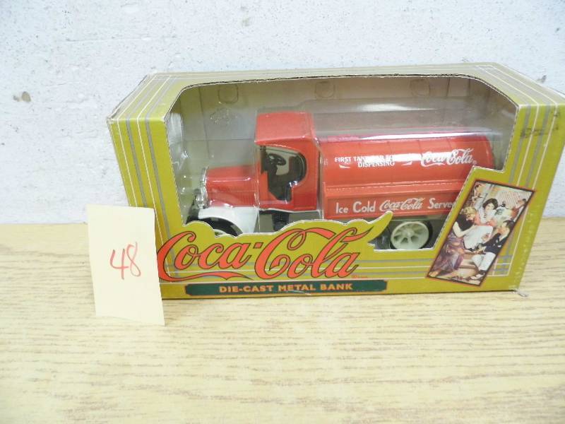lot 48 image: Coke Die Cast Bank