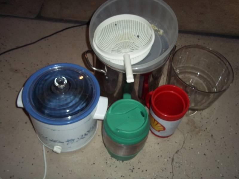 Crock pot, coffee mugs, kettle, bowls