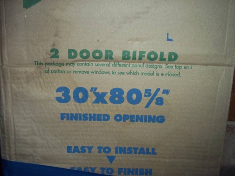 Bi Fold Closet door in box