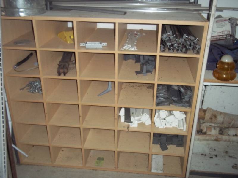 Large lot of shelf brackets, does not include wood shelving