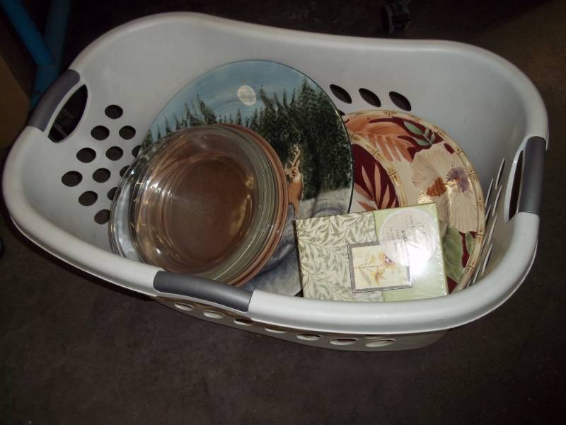 Clothes Basket with Glass Bake ware and Serving Plates