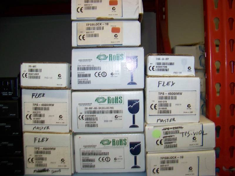 lot 56 image: (2 - 8 wide shelves) Crestron, Touch Screens, Switches, Controllers, Controls, Processors, Wall Plates and More