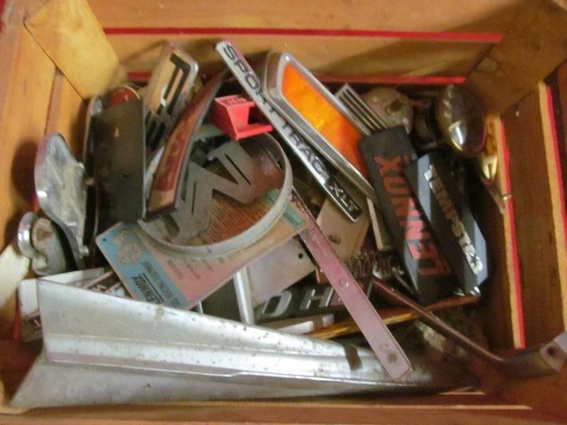 wood crate with vintage appliance and automotive emblems