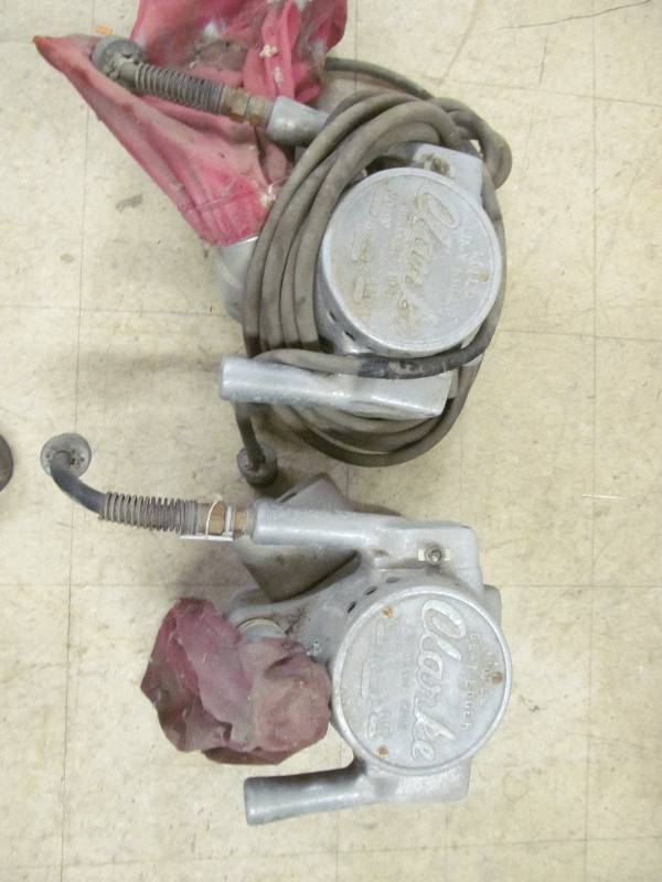 vintage pair of Clarke floor sanding edgers