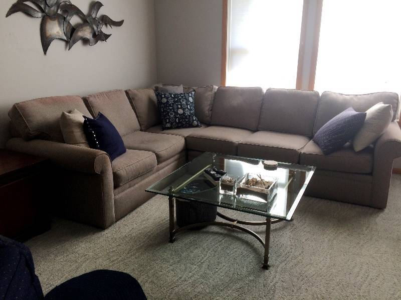 lot 21 image: High Quality Rowe Furniture Baker Sectional Sofa 118 x 39 x 90 - Comes with Accent Pillows - Nice Condition - Fabric Has Sun Coloring In Areas On Cushion Tops