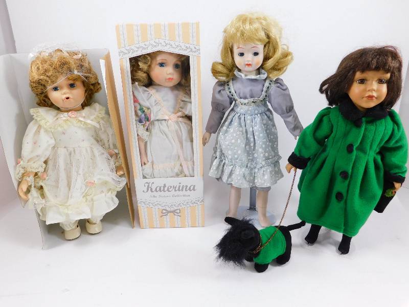 Lot of 4 Porcelain Dolls