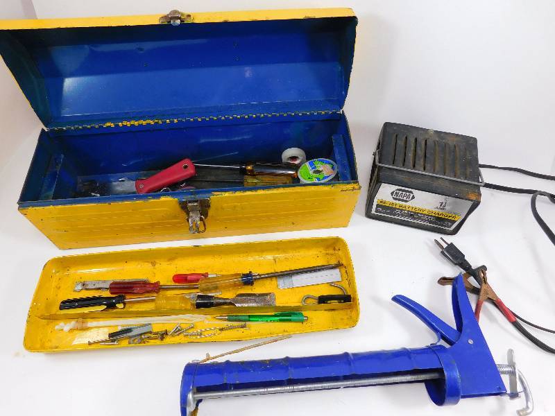 Lot of Tools in a Toolbox and a Battery Charger