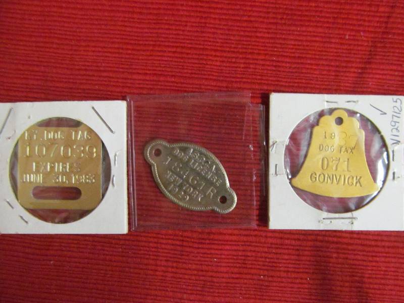 lot 68 image: Collectible Dog Tags