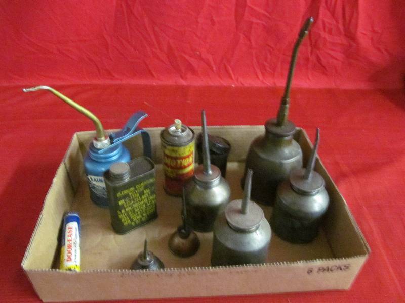 lot 203 image: vintage oil cans