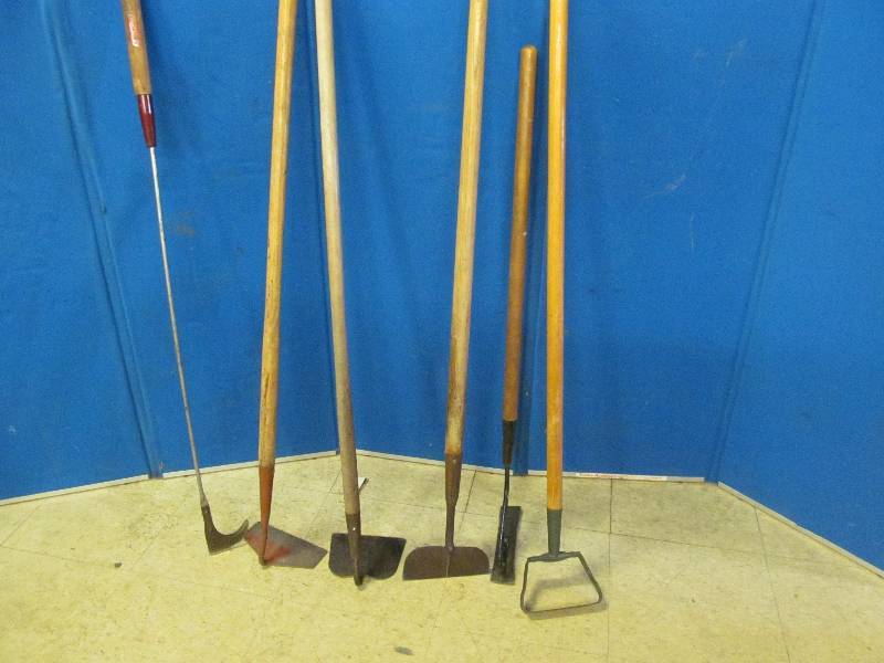 lot 213 image: hoes, weed cutters