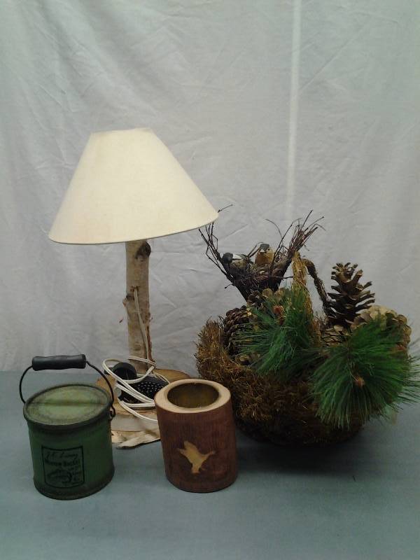 lot 7 image: Birch Bark Lamp, Rustic Pine Cone Arrangement, Decorative Minnow Bucket, Candle