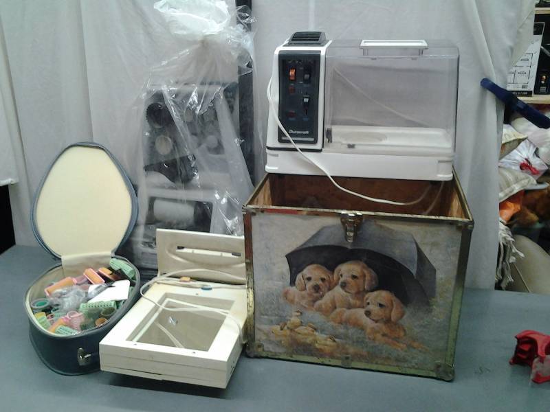 lot 21 image: Kirby Vac Attachments, Lighted Make-Up Mirror, Case Of Hair Rollers, Small Humidifier, Puppy Box