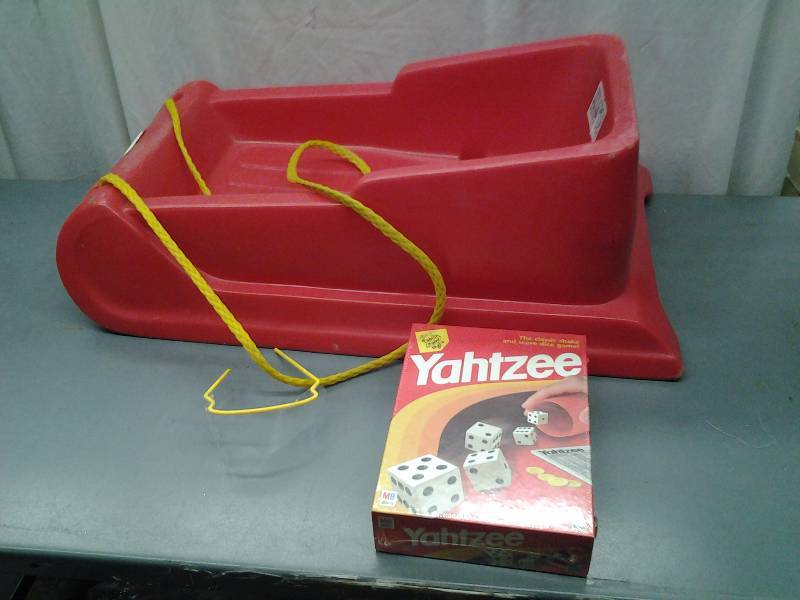 lot 22 image: Flexible Flyer Plastic Sled, New Yahtzee Game