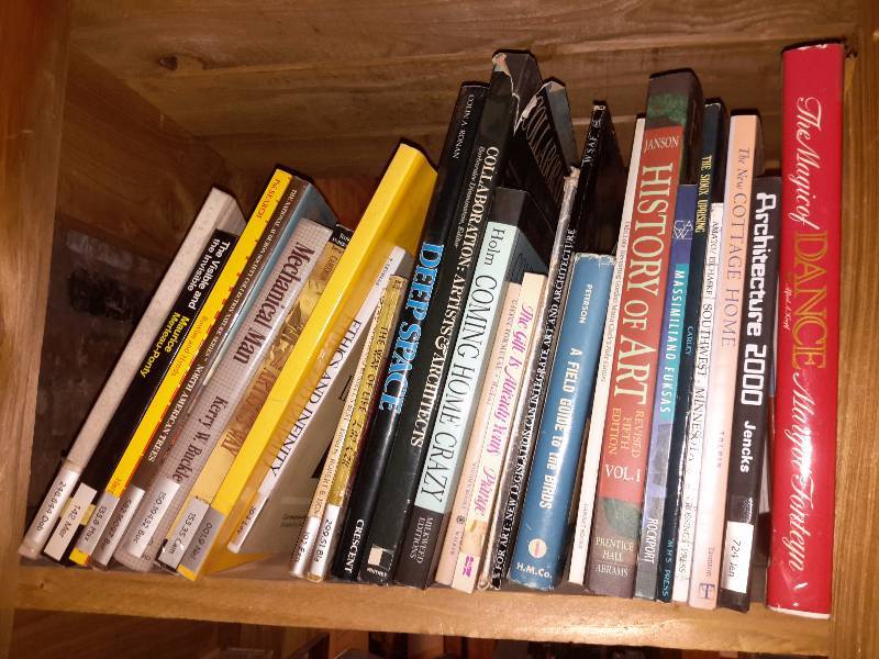 lot 125 image: Books on the book shelf as pictured