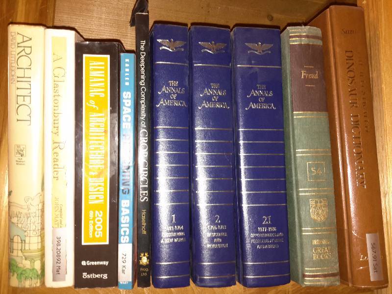 lot 127 image: Books on the book shelf as pictured