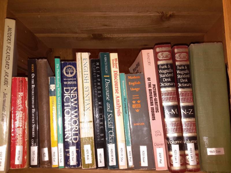 lot 128 image: Books on the book shelf as pictured