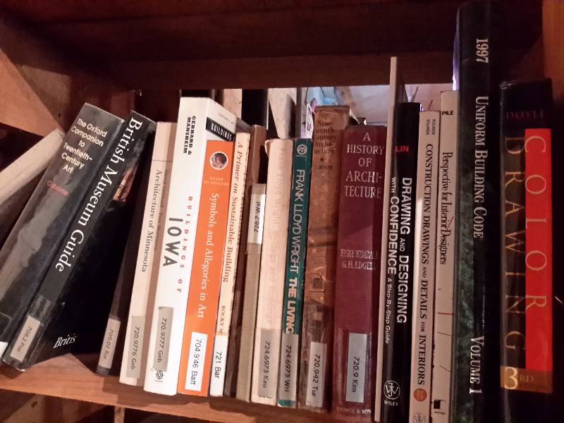 lot 131 image: Books on the book shelf as pictured