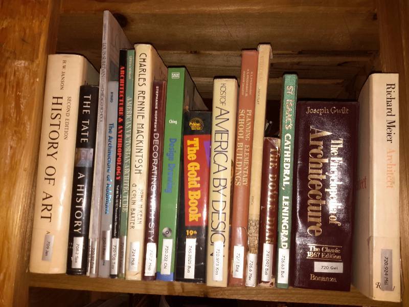 lot 132 image: Books on the book shelf as pictured