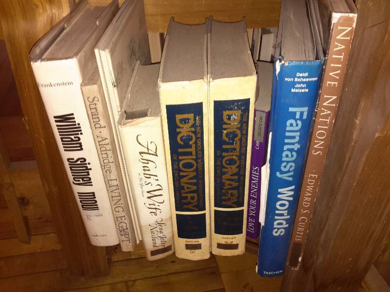 lot 135 image: Books on the book shelf as pictured