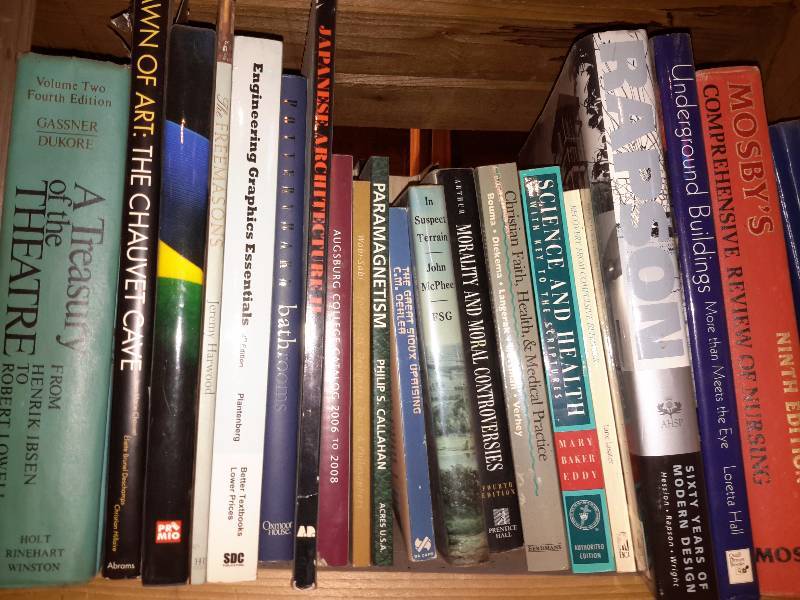 lot 136 image: Books on the book shelf as pictured