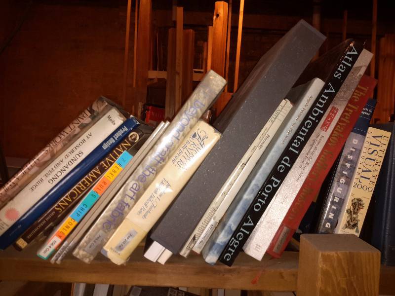 lot 140 image: Books on the book shelf as pictured
