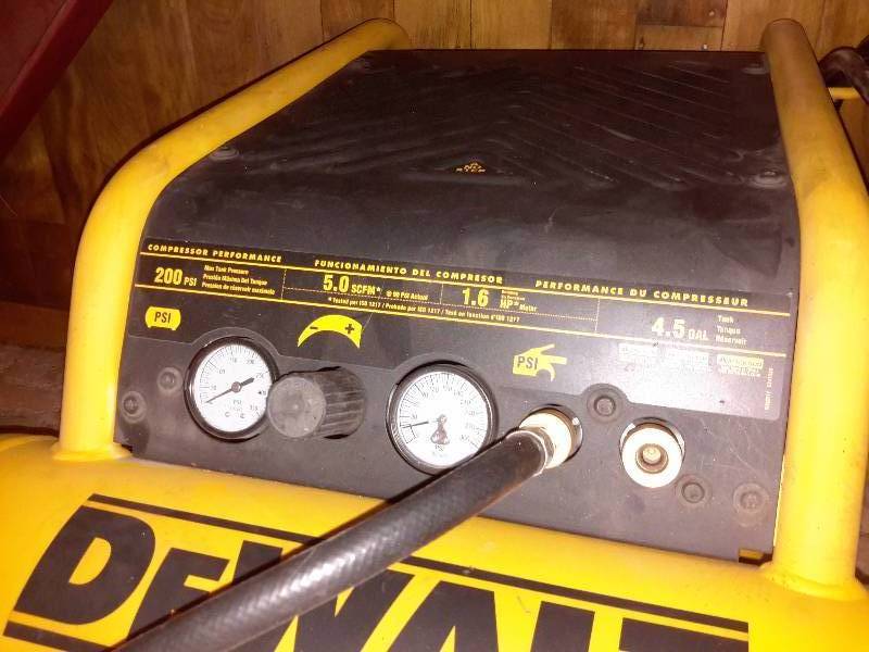 lot 68 image: DEWALT, 4.5 gallon, 200 psi Air Compressor on 2 wheel cart