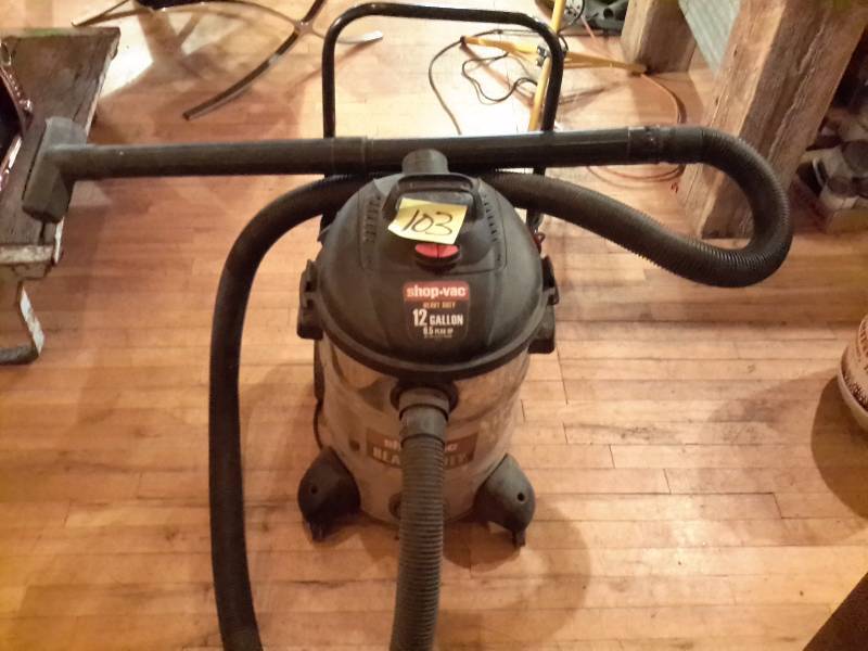 lot 103 image: Shop Vac Heavy Duty 12 gallon vacuum.