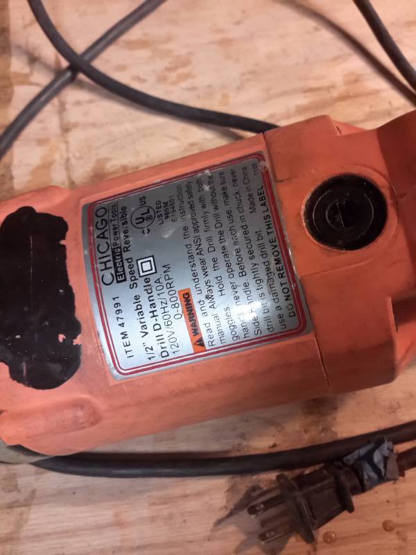 lot 24 image: Chicago Power Tools, 12 in Variable Speed, Reversible Drill