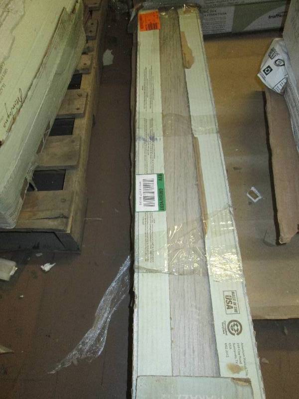4 packages of floor tile some of th...
