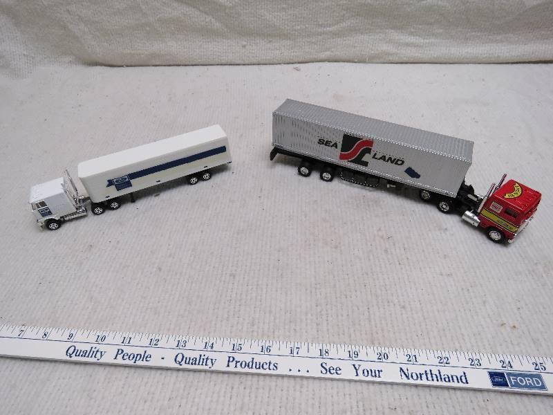 lot 1 image: Collectible Semis and Matching Trailers