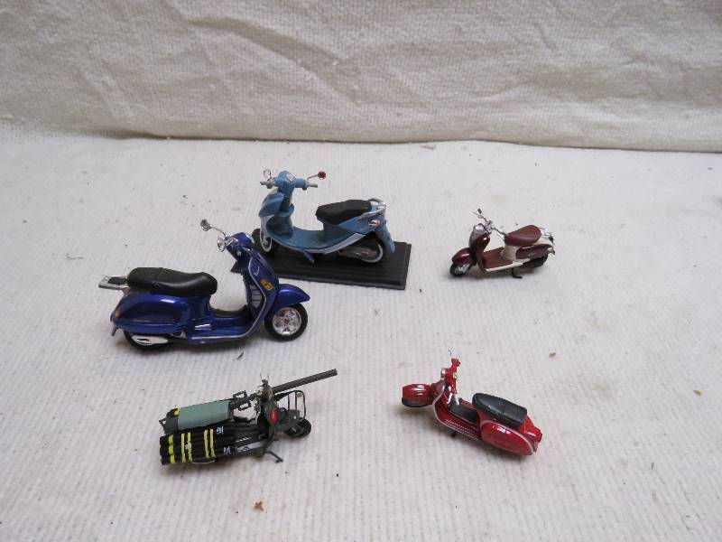 lot 89 image: Collectible Scooters