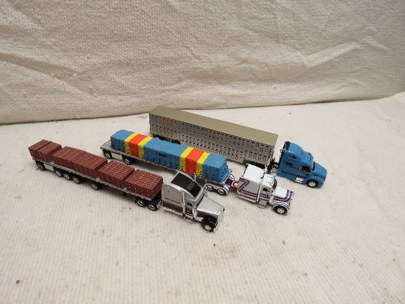 lot 111 image: Collectible Semis and Matching Trailers