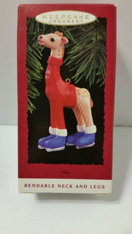 lot 42 image: Hallmark Keepsake Ornament - Bendable Arms and Legs Edition Giraffe In Original Box