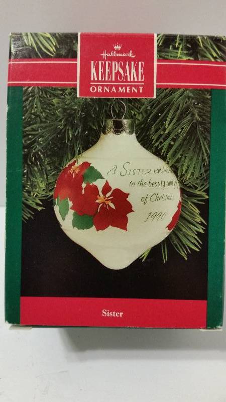lot 44 image: Hallmark Keepsake Ornament - 1990 Edition Sister Bulb In Original Box