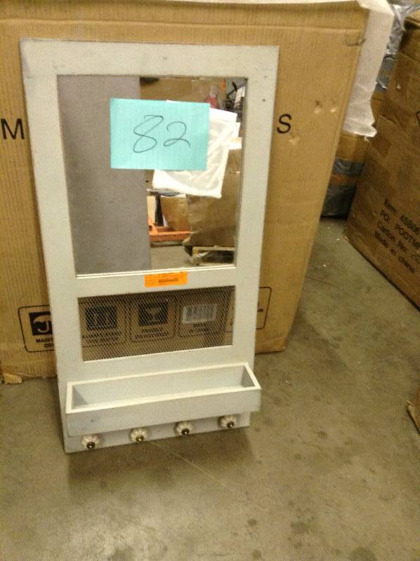 Mirror with hooks