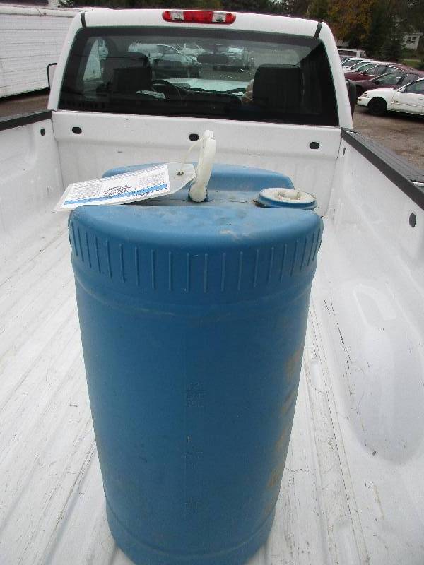 lot 94 image: Rubbermaid tool box and vented liquid storage container