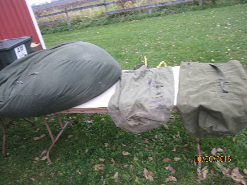 2 Army duffel bags and a army green...