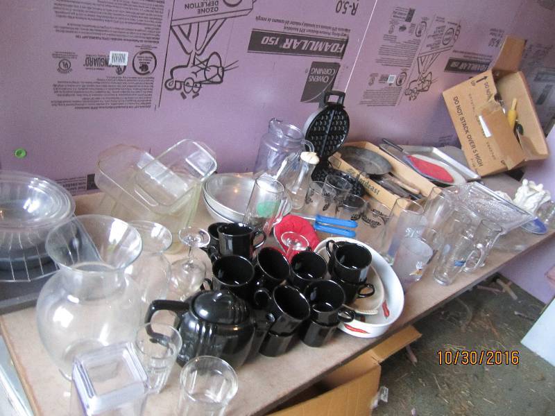 Table full of glassware, beer glass...