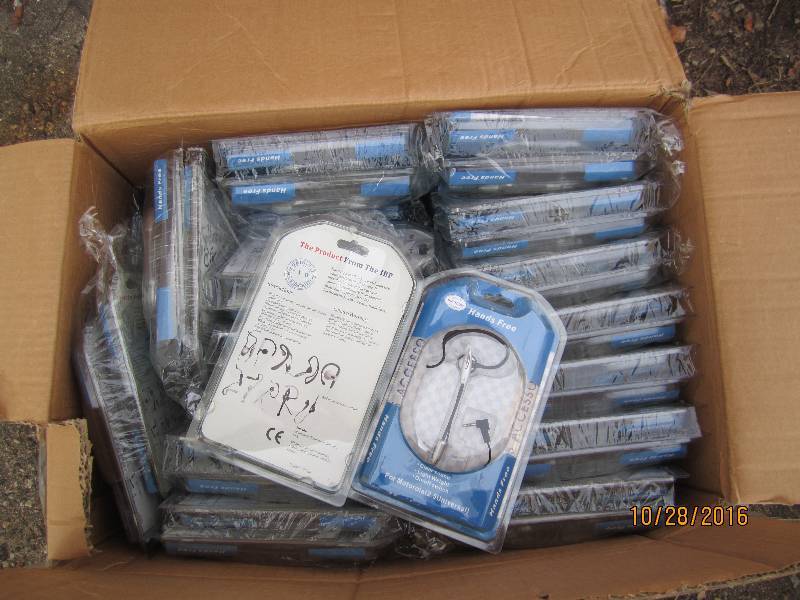 lot 53 image: Case of 100 hands free headsets...