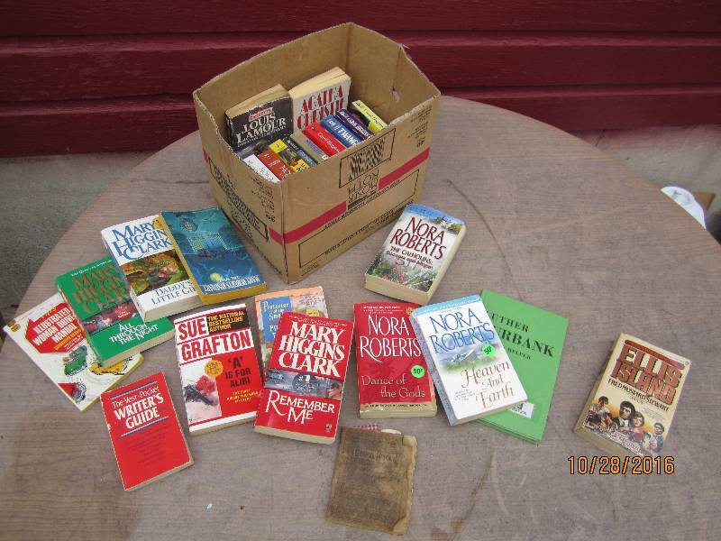 lot 75 image: Box of paperbacks and an old hymnal...