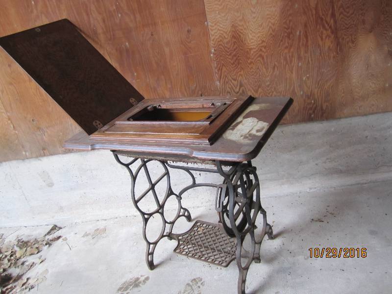 lot 101 image: Antique sewing machine base...