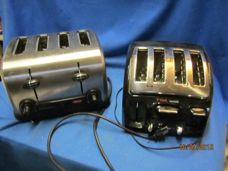 lot 4 image: Pair of stainless steel toasters by...