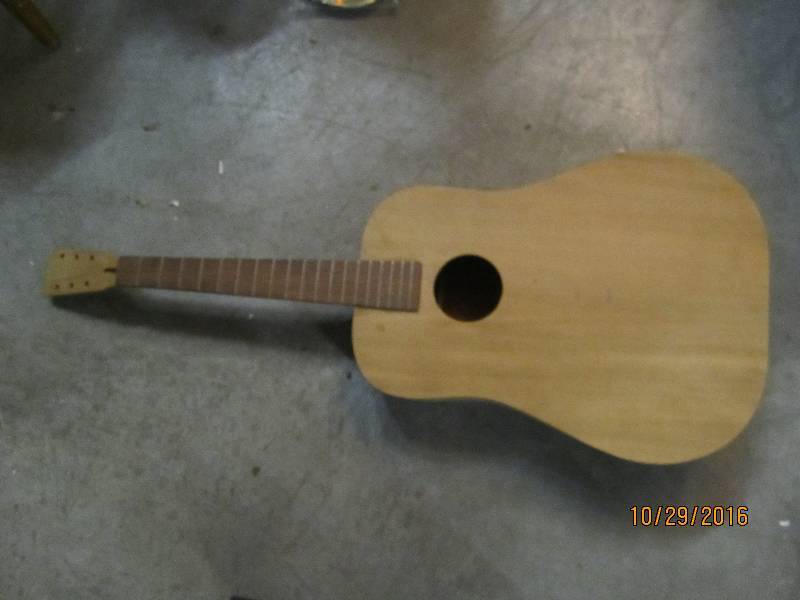 lot 6 image: Wood guitar shell with kit, ready t...