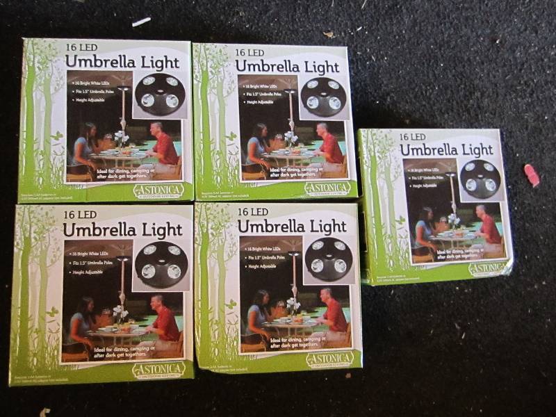 lot 12 image: 5 16 LED umbrella lights new in box...