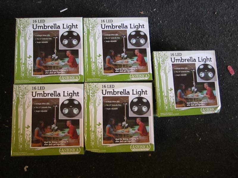 lot 14 image: 5 16 LED umbrella lights new in box...