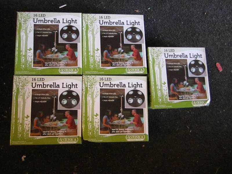 lot 15 image: 5 16 LED umbrella lights new in box...