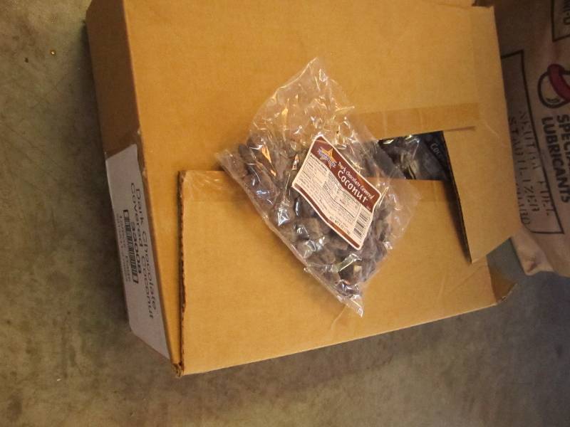 lot 131 image: box of chocolate covered coconut...