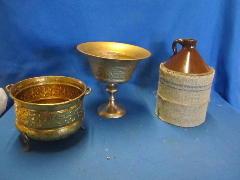 lot 198 image: Earthen jug and metal holders...